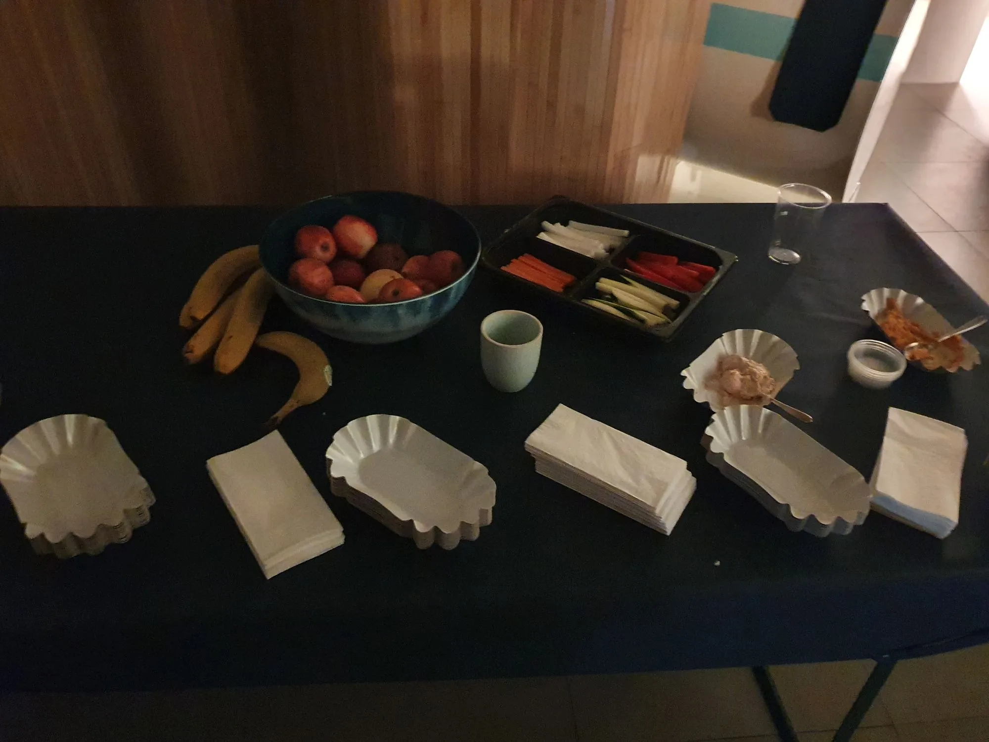 Spread of homemade hummus and healthy snacks