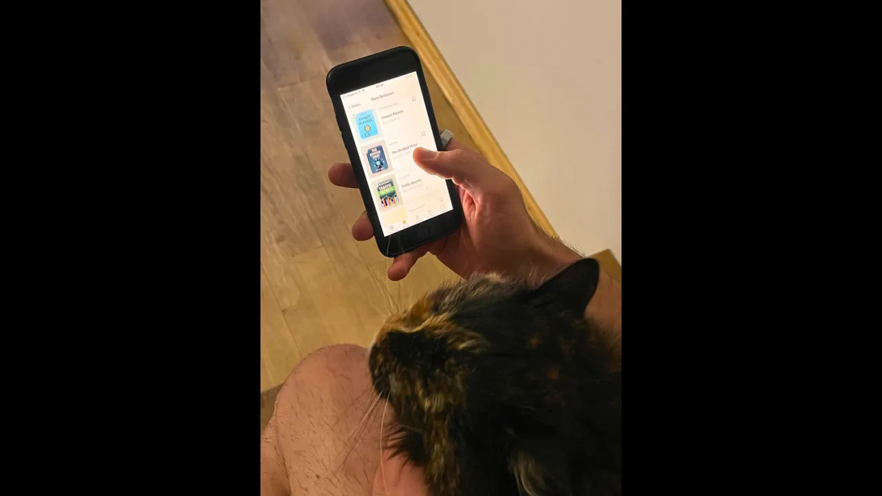 Shortform app screen showing a book summary on a phone