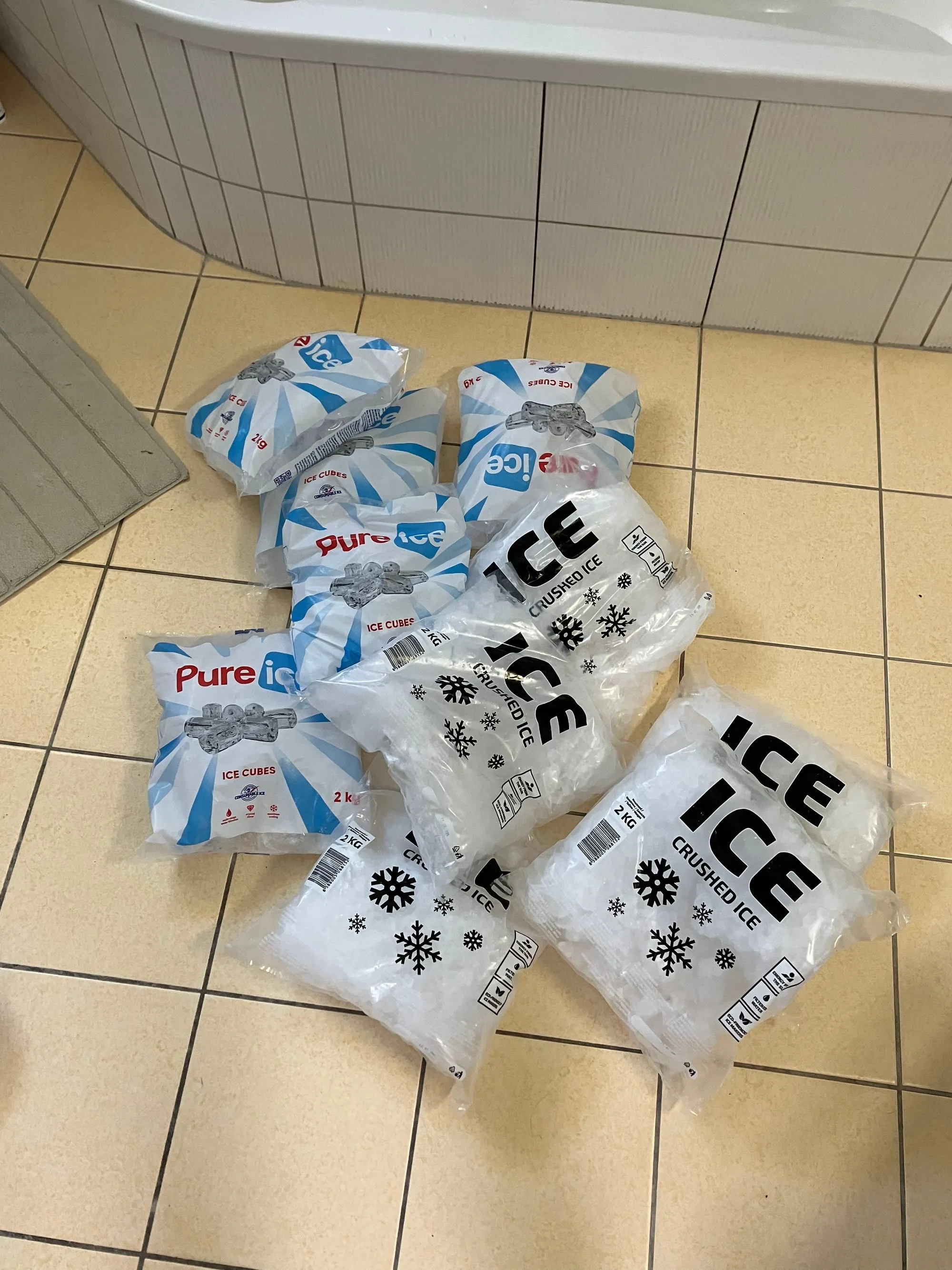 Person in ice bath outdoors during winter