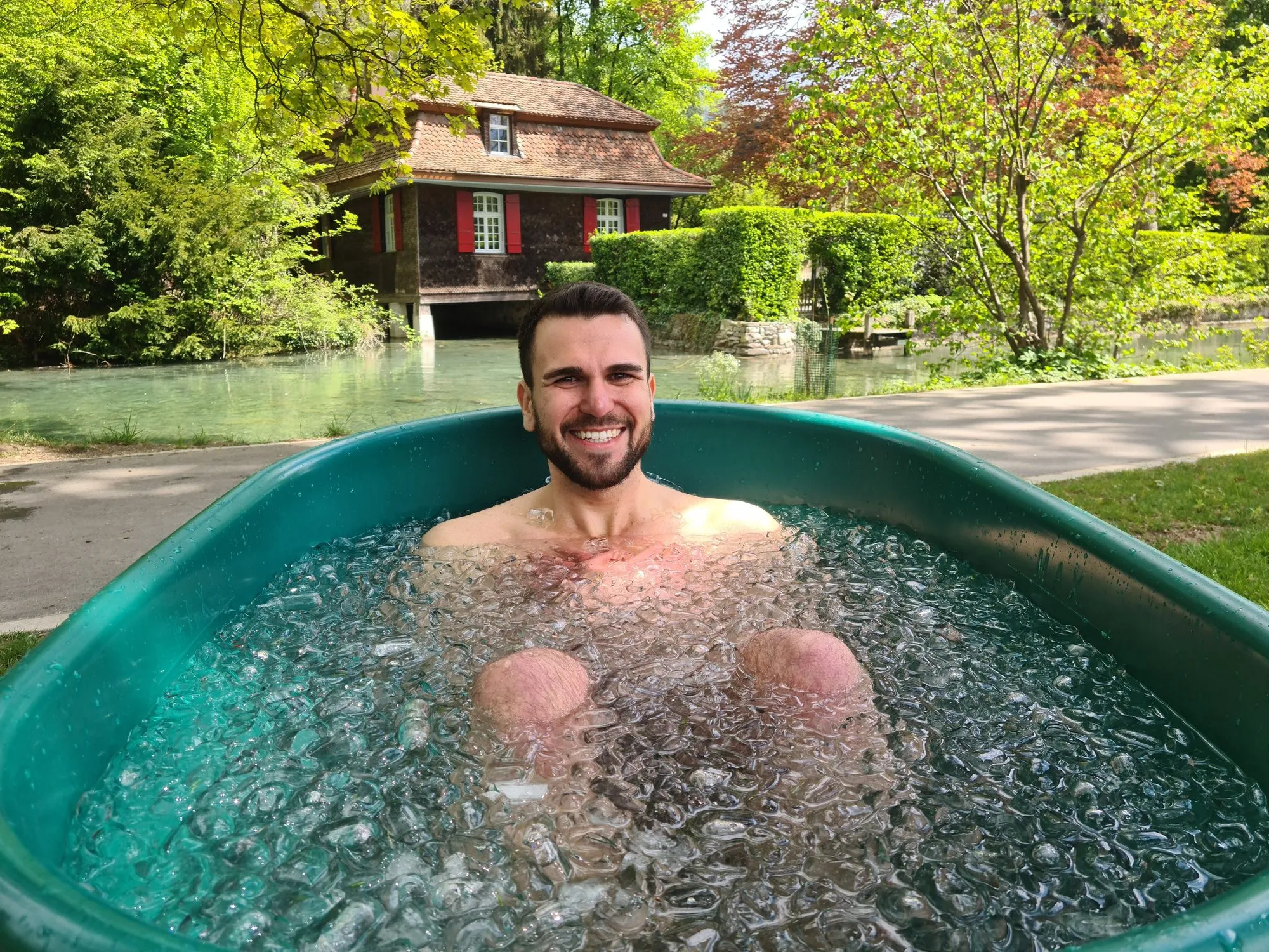 Person in ice bath at Wim Hof workshop