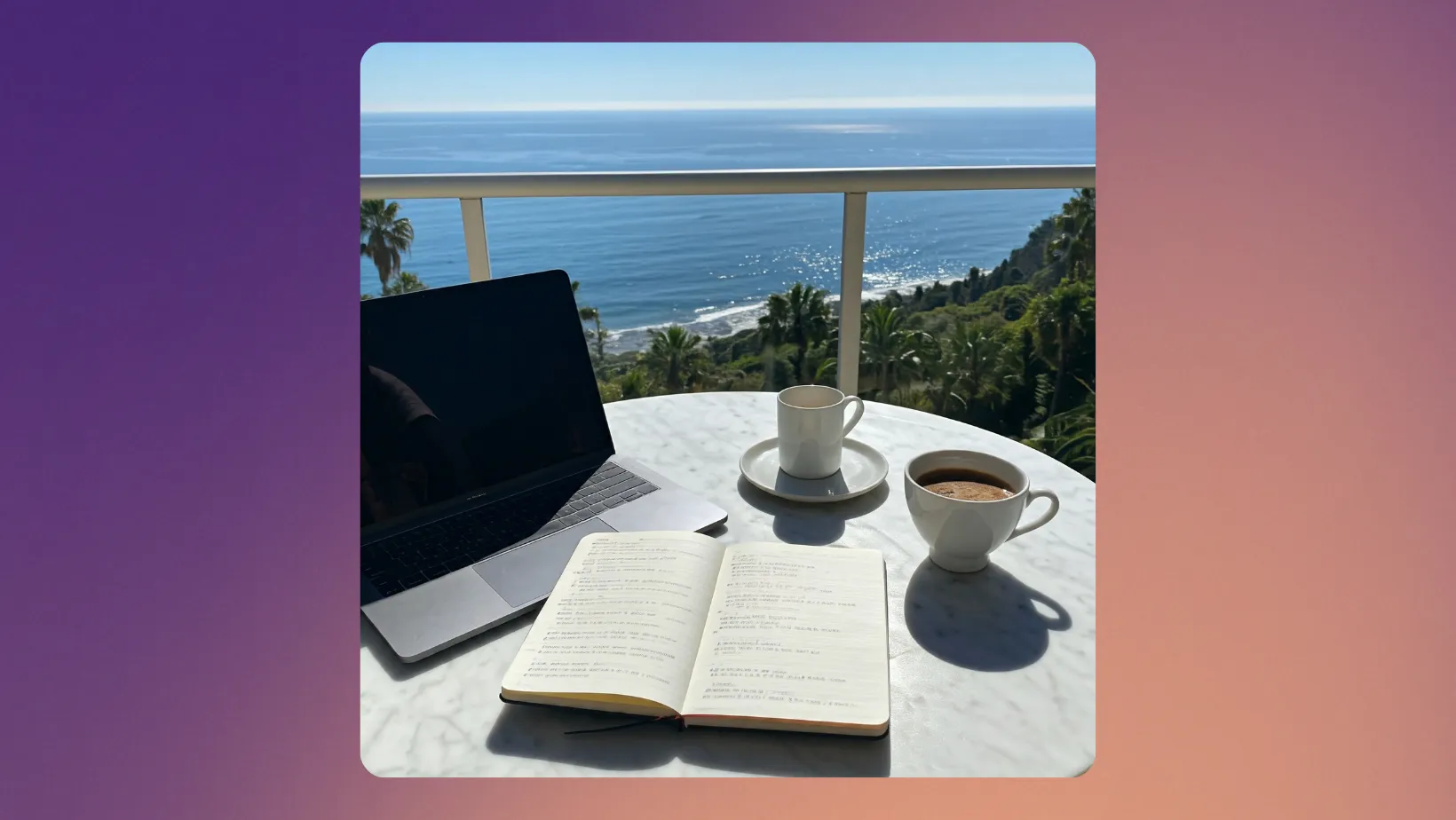 Open notebook and coffee on a balcony table overlooking the sea